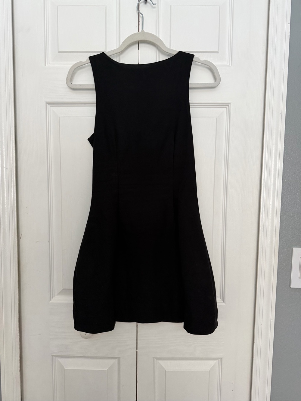 Chic Black Sleeveless Mini Dress - Sleek A-Line Style with built in shorts